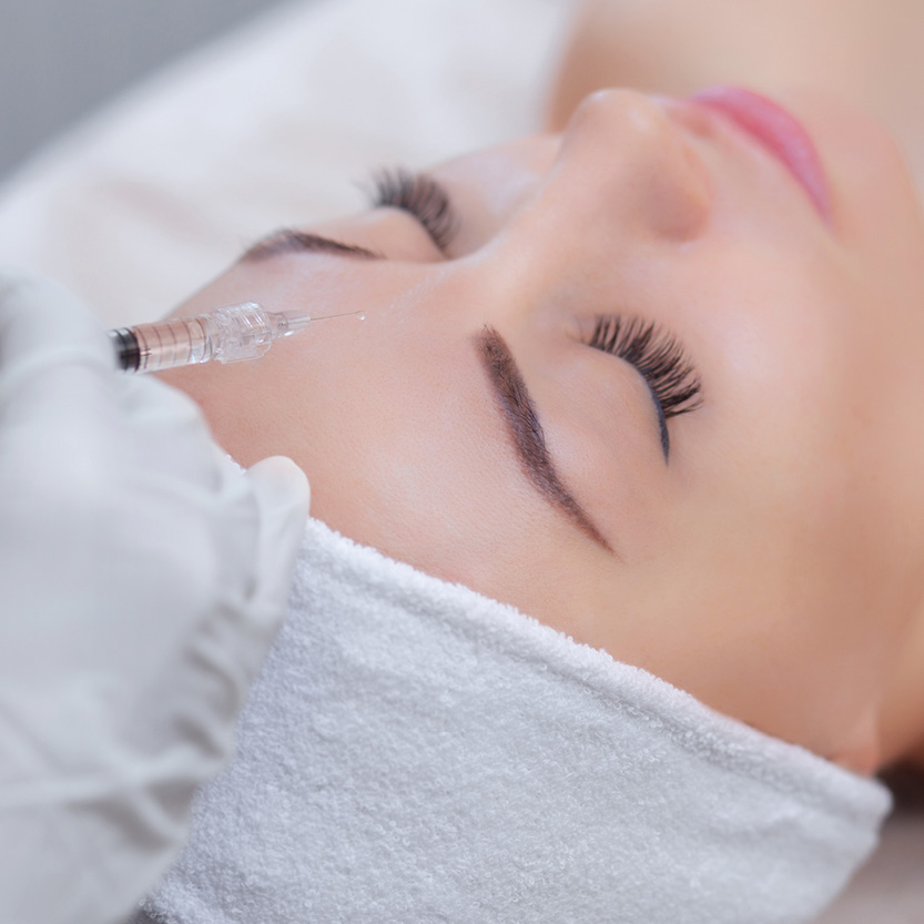 Woman receiving cosmetic injections Melbourne at beauty salon